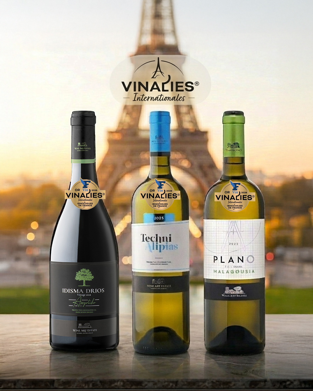 Three bottles of Wine Art Estate wines in front of the Aifel tower