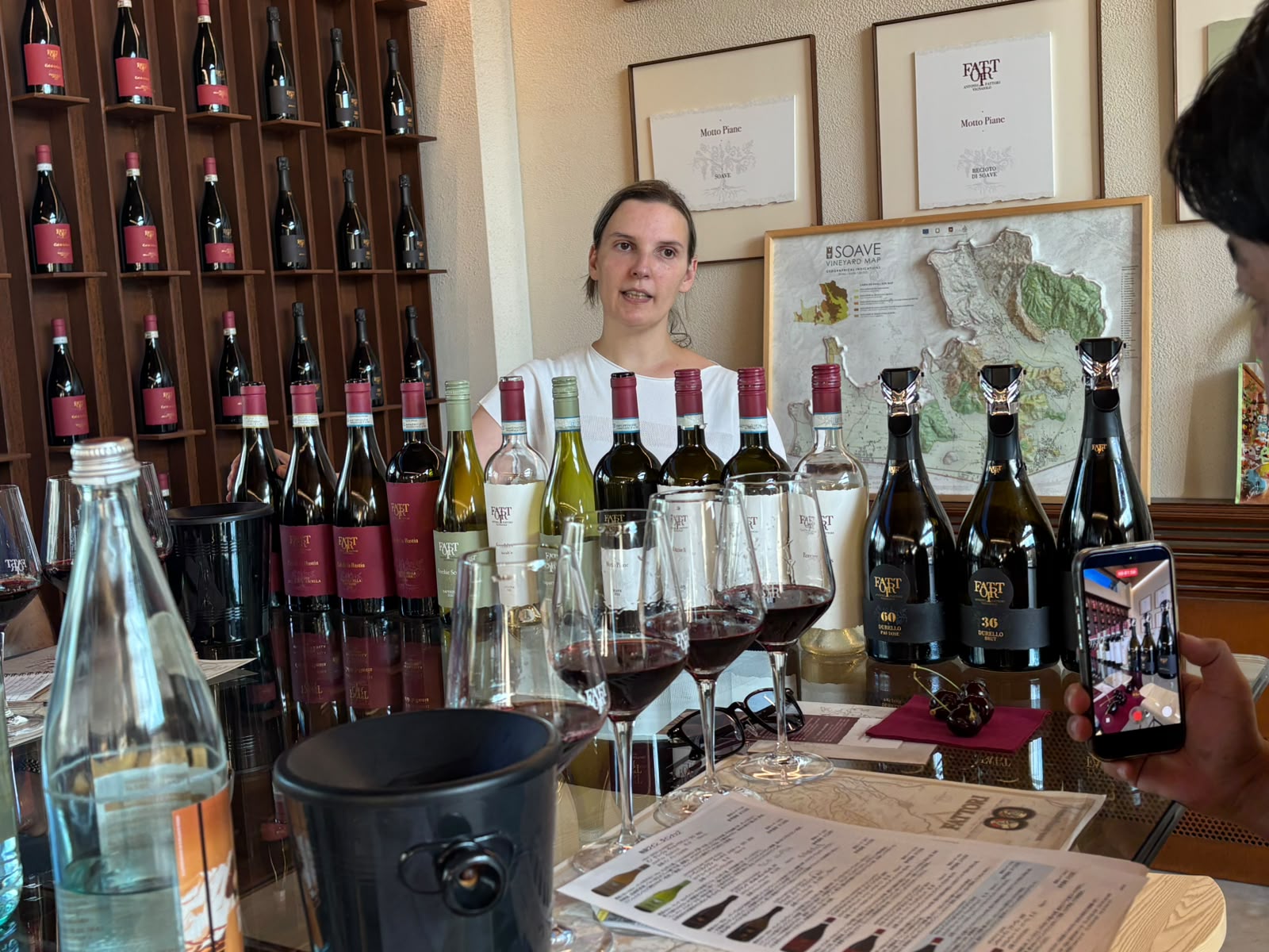 A woman presenting wines