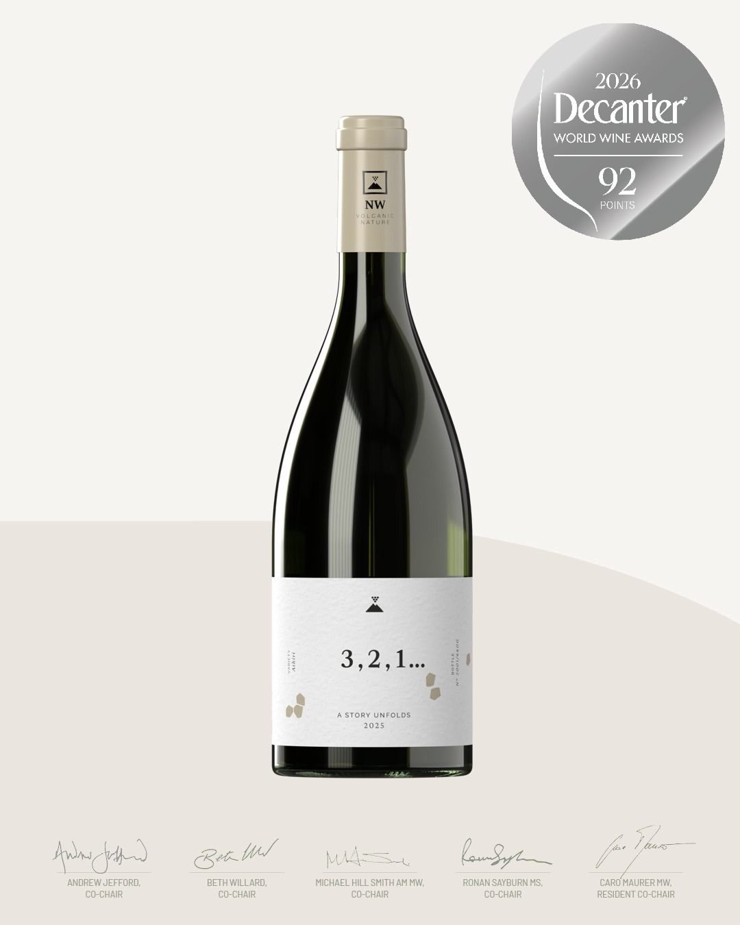 A poster of a wine award, the award and the wine bottle