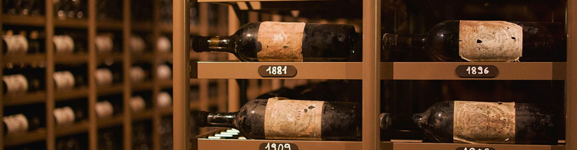 Exclusive and rare Italian & Greek wines to the Importers Club A collection of vintage wine bottles from an old cellar. Use our service to get exclusive wines for importers.