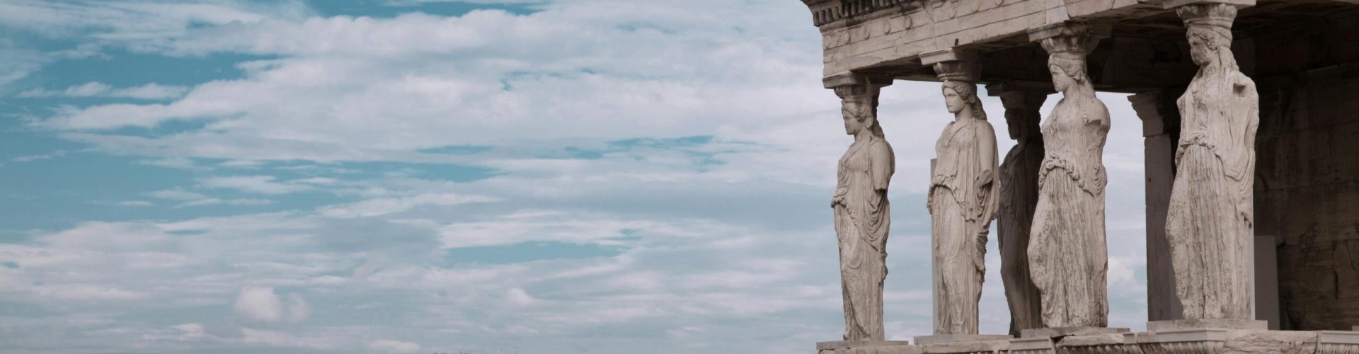 Greece Erechtheion temple on the Acropolis, Athens, with iconic Caryatids statues.